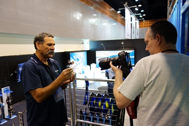 Fisho's Scott Thomas filming Bushy talking about Squidgy's new prawn lures.